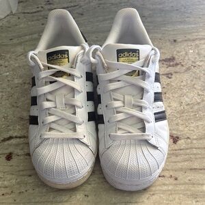 Adidas women size 6 1/2 White and black Sneakers